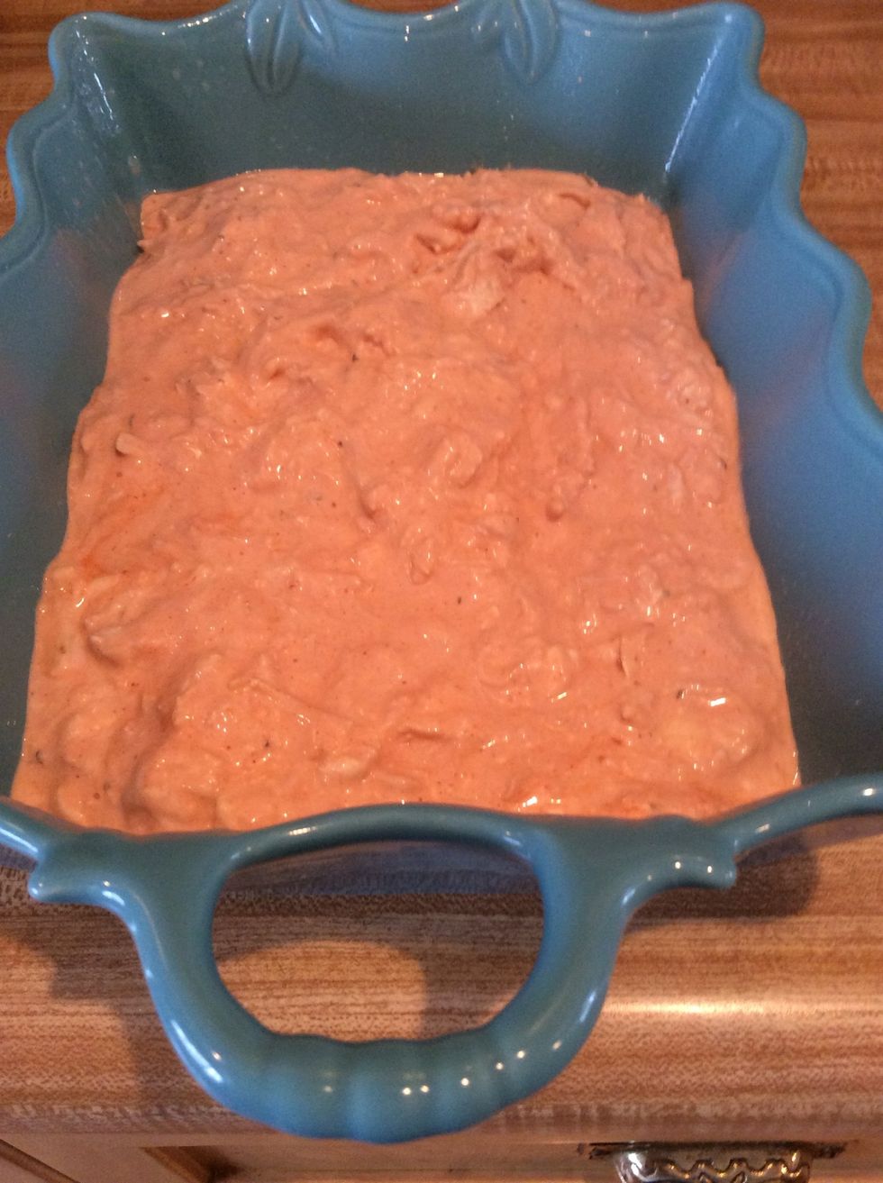After it has been mixed up, pour it into the greased baking dish. Place it in the oven for 25 minutes at 375 degrees.
