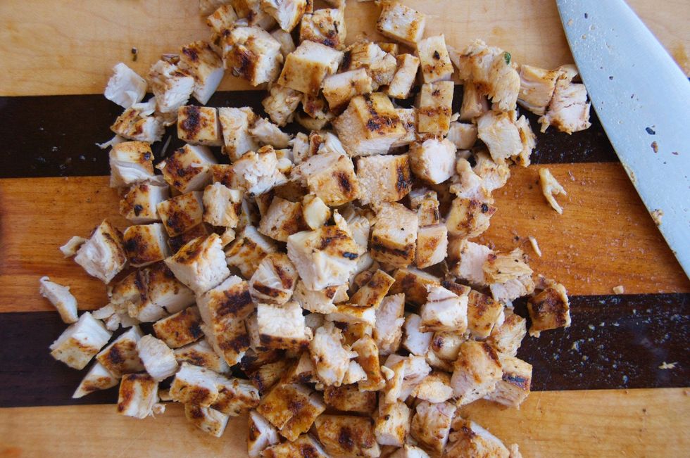 After it has rested, cut the chicken into 1/4" cubes. Make sure to let it rest so it sucks back up all the juices it released while cooking - this is important so make sure to rest for 10 minutes.