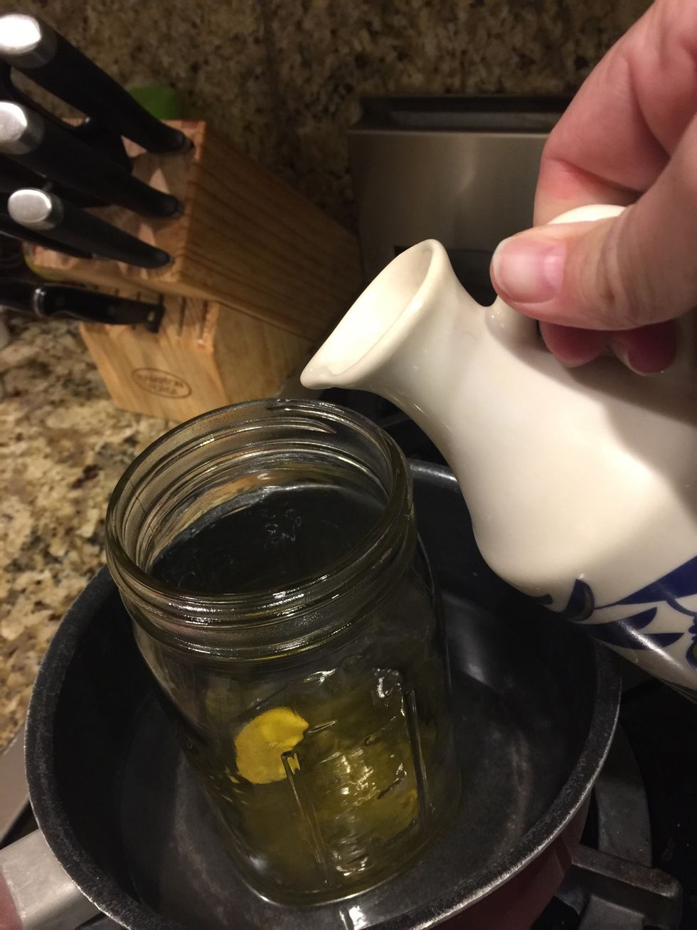 After it has steeped for an hour take out the teabags and add beeswax and olive oil. Allow to melt completely.