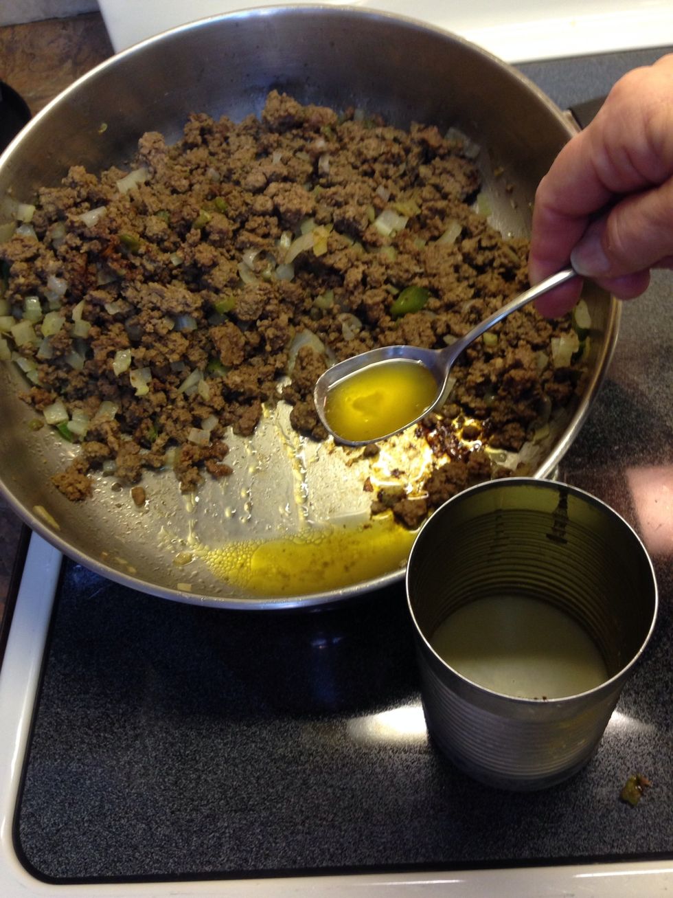 After it's browned, drain.... Even lean ground beef has some fat that can be spooned off. Tilt pan and it will gravitate to one side for easy removal.