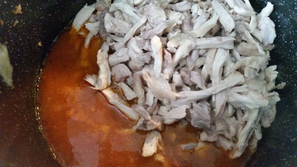 After it's shredded. Add to the pot. Stir it up! Cover it up and let simmer for about 15 minutes.