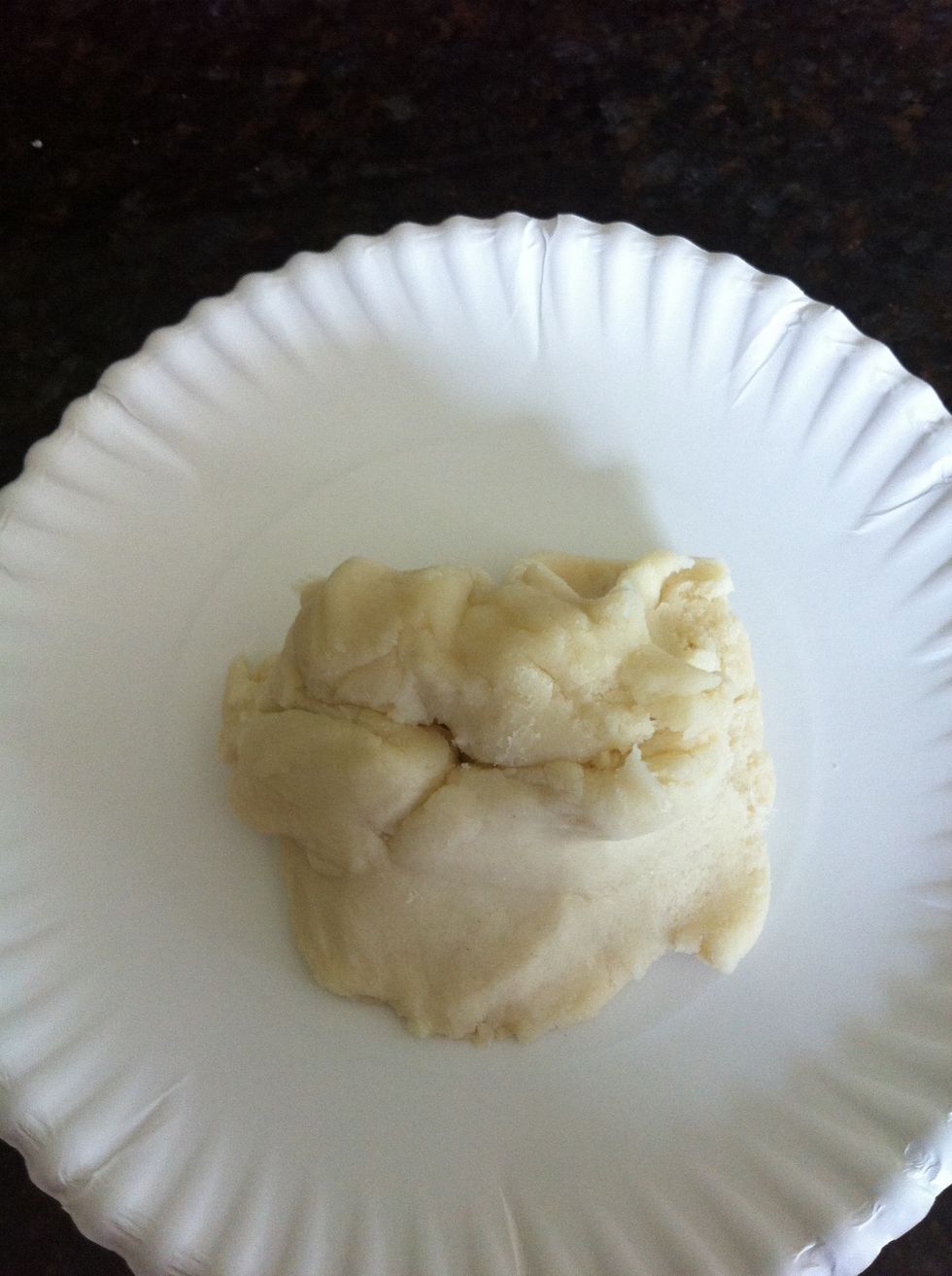 After it's turned into a clump, put it on a cutting board. (My cutting boards are dirty, so I just put it on a paper plate :P) Knead it for a few minutes.