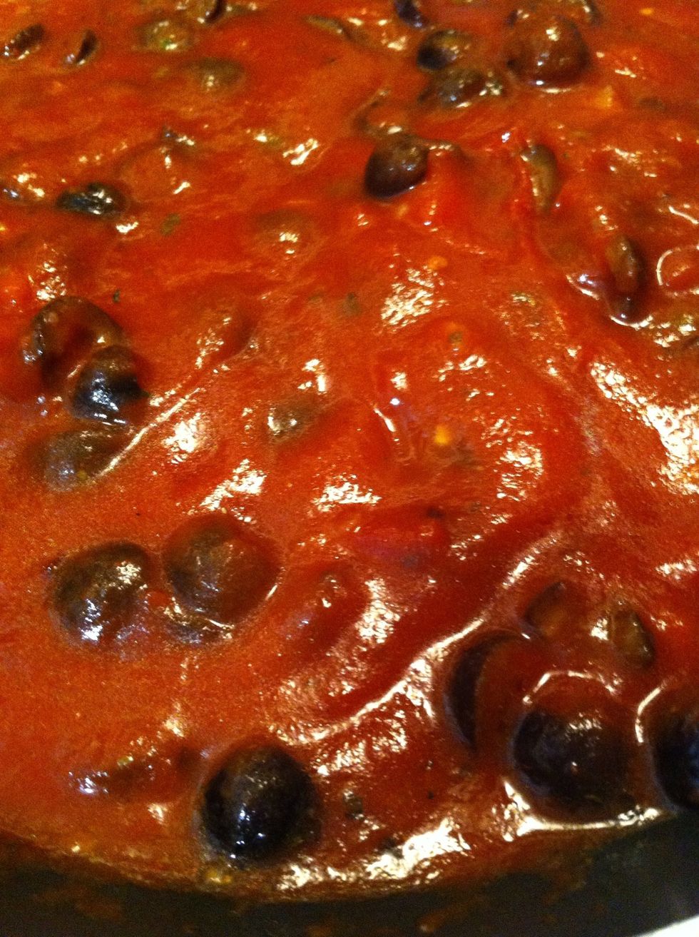 After letting cook on medium-low heat for a bit, add in can of plain sauce - let simmer; you'll want to make sure it doesn't bubble or boil (add in another layer of seasoning here)