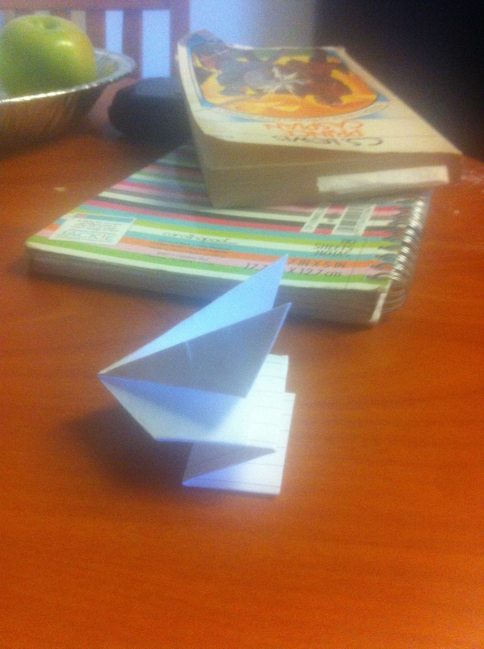 After making the folds into the middle, each flap was stood up vertically to make the ears. Also, you can use scissors to make your ears (if you're more crafty than I am).