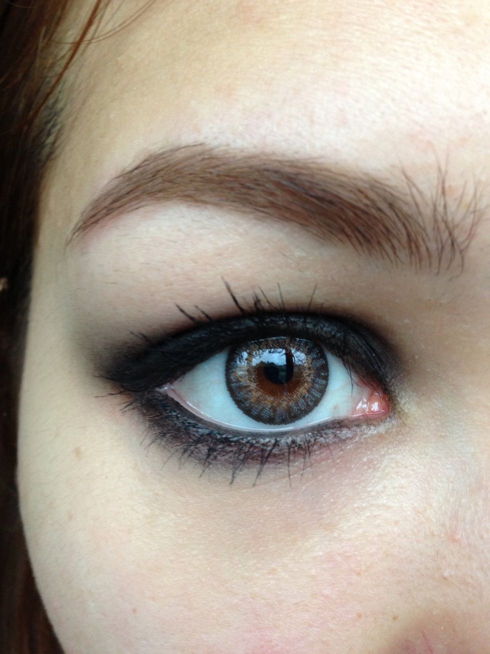 After mascara, smudge tidying and a little filling in of the brow, you have a black smoky eye.