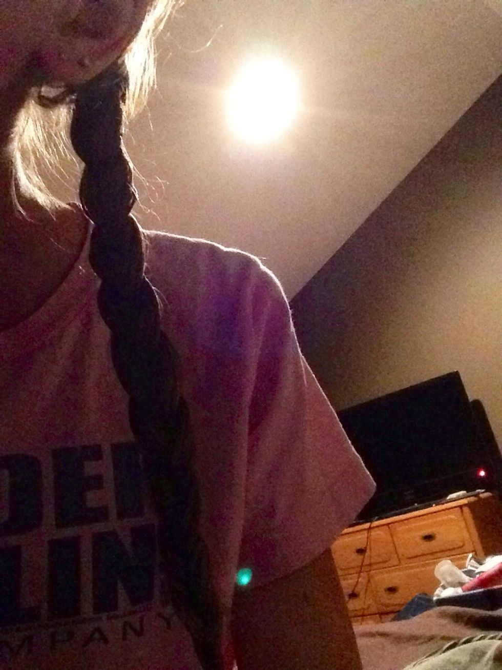 After massaging the gel in, braid your hair and elastic it on the end, I only did two braids, but u can do any amount. If u want looser crimped hair, put in less braids, and do the opposite for tiny.