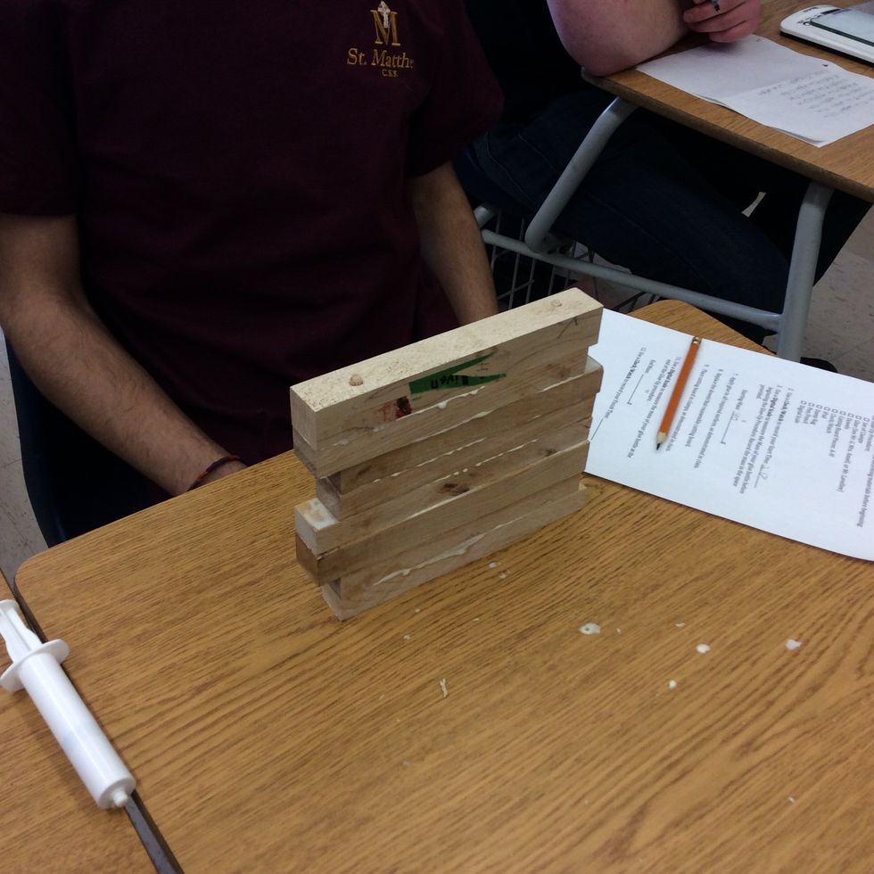 After measuring and practicing you have to insert all dowels and glue each piece of wood together with titebond3 ultimate wood glue it's safe for anything you cut.