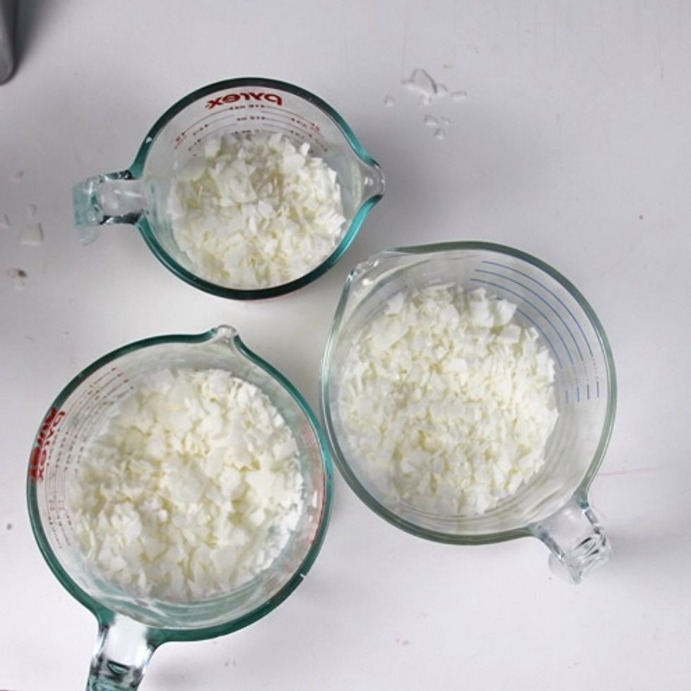 After measuring wax into the large container, split the wax into three containers each measuring 5.2 oz. At this point, melt your wax by putting the containers in the microwave for 1 minute intervals.