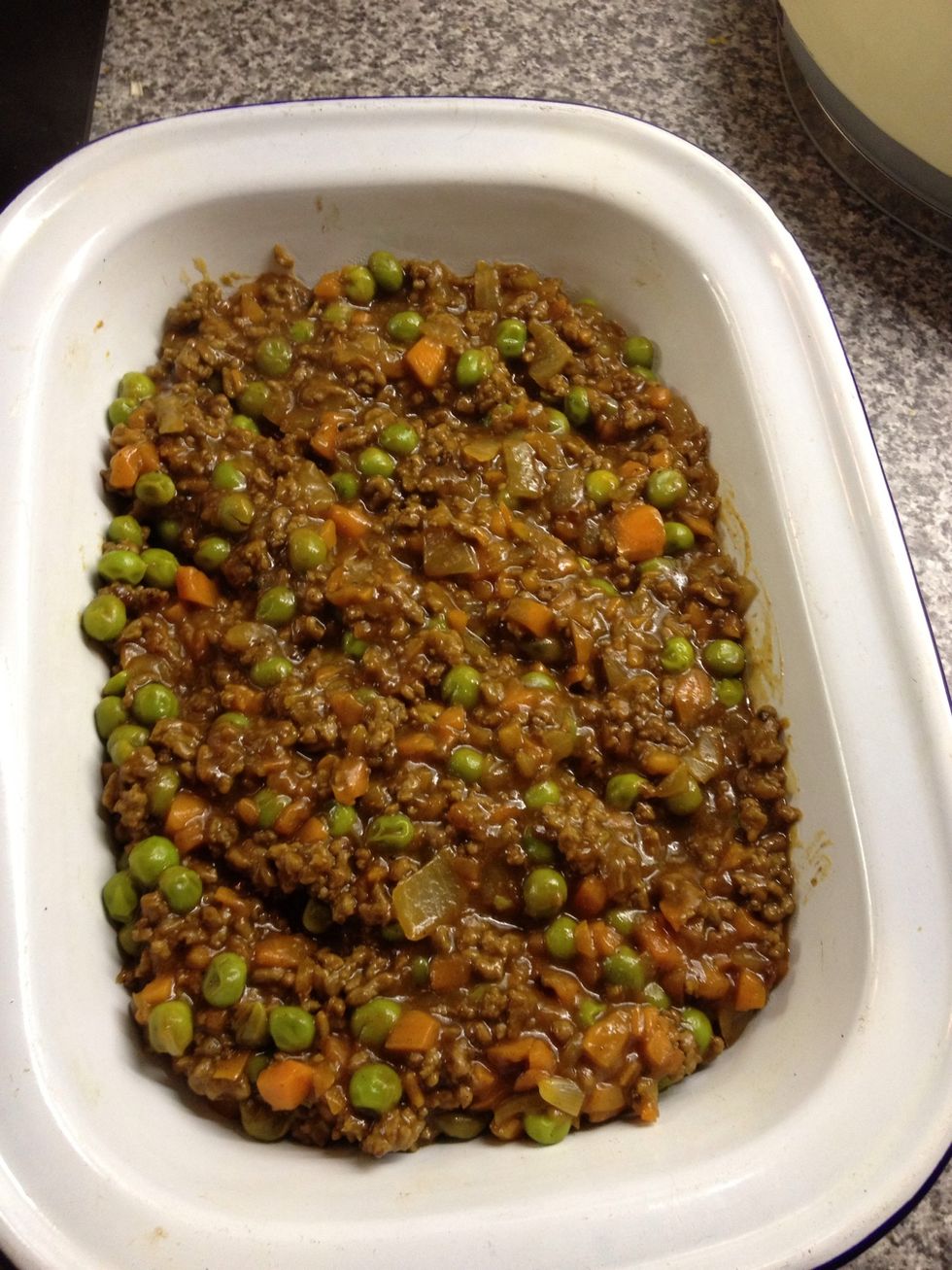After meat and veg are cooked and tasting amazing, scoop into an oven dish.