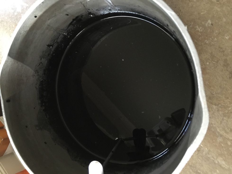 After mixing all ingredients. Mixture should be dark and opaque. Make sure to mix well. Place saucepan over medium heat. Make sure candy thermometer is attached or sits up in pan.