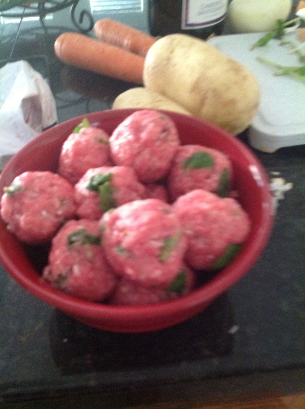 After mixing the meat together make descent size meatballs