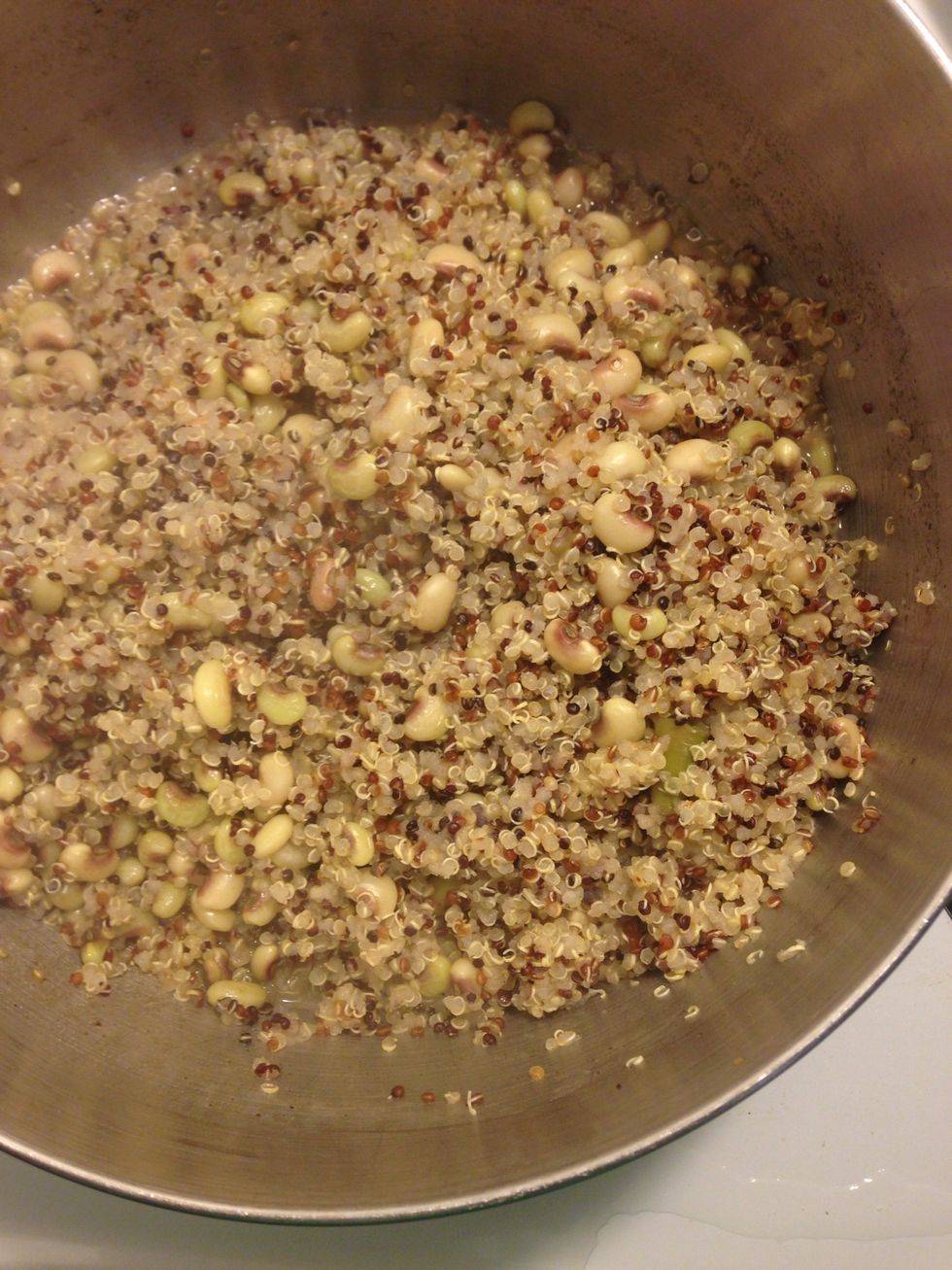 After peas & quinoa start to boil, drop temp to low, cover & simmer for 20-30 mins.