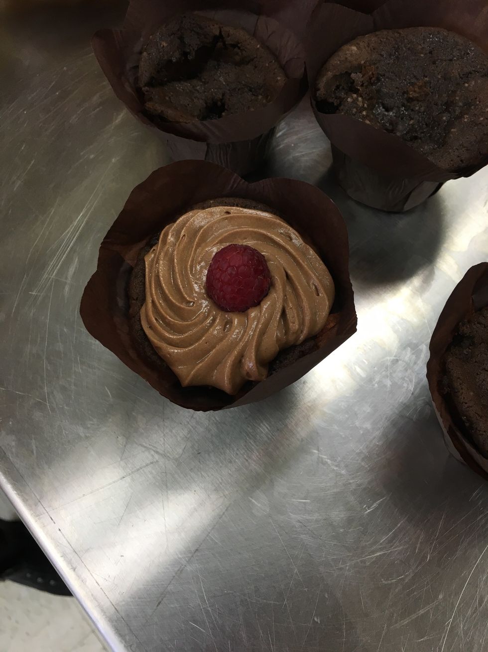 After piping, add fresh fruit for garnish.
