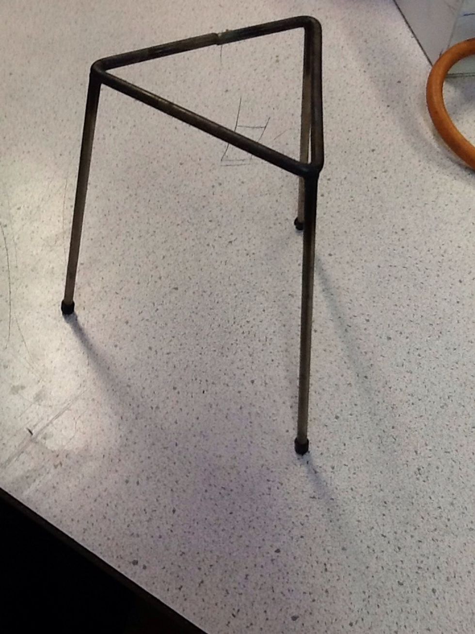 After place your triad over the Bunsen burner
