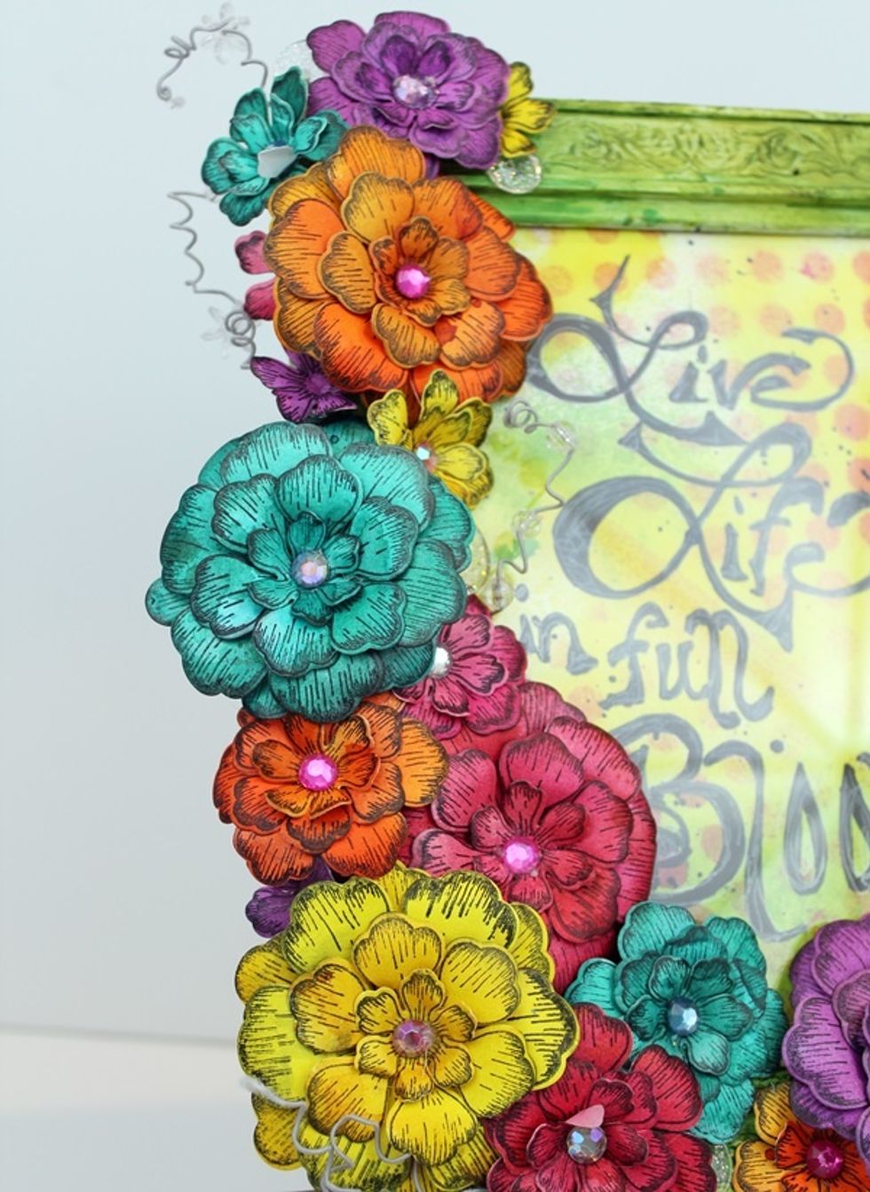 After placing all the flowers I added a quick quote to my frame.