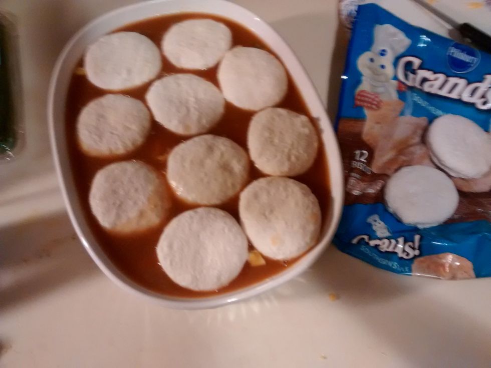 After placing your cheese on top, carefully place your biscuits on top of the soup mixture. Then place in the oven and bake for 38-43 minutes. (Until biscuits are golden brown on the top.)