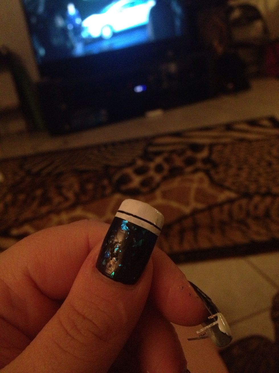 After polish has dried for 5 minutes pull the tape off