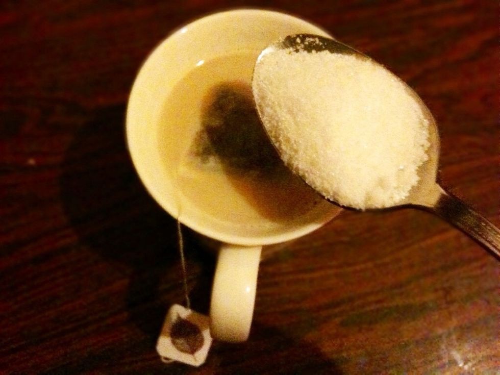 After pouring the milk on the tea, add some sugar to taste. It's not requiered (I almost never use sugar on tea) but a little sugar won't kill you (unless you're diabetic)
