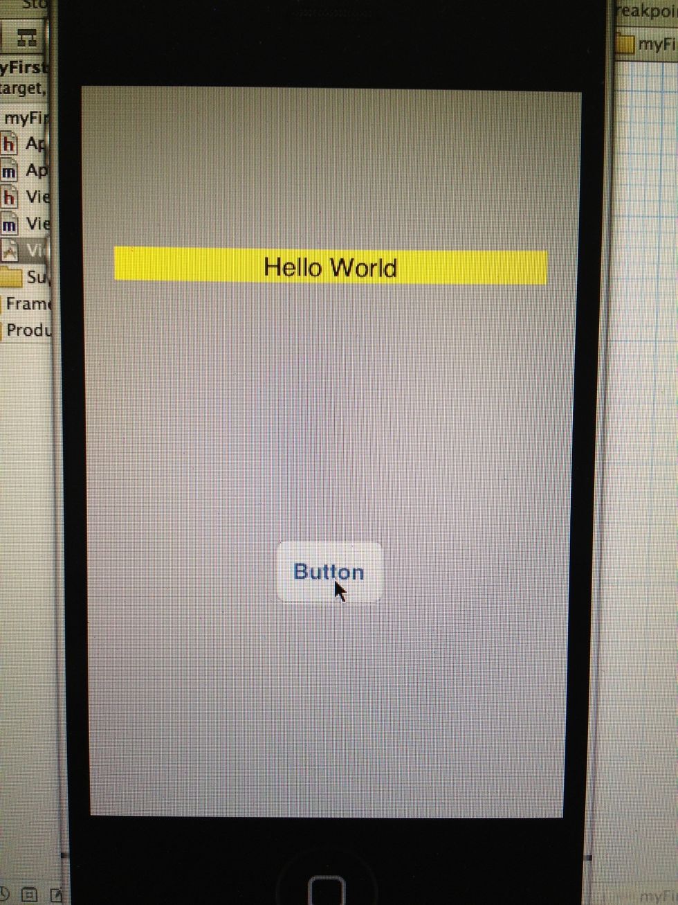 After pressing, you see our Label is filled with our Text, its background color is yellow, and the alignment changed to center... Seems like our "Hello World" App is finished. :-)