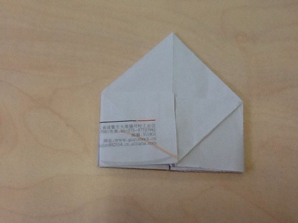 After, pull the open side of the triagal,in square in the both side.