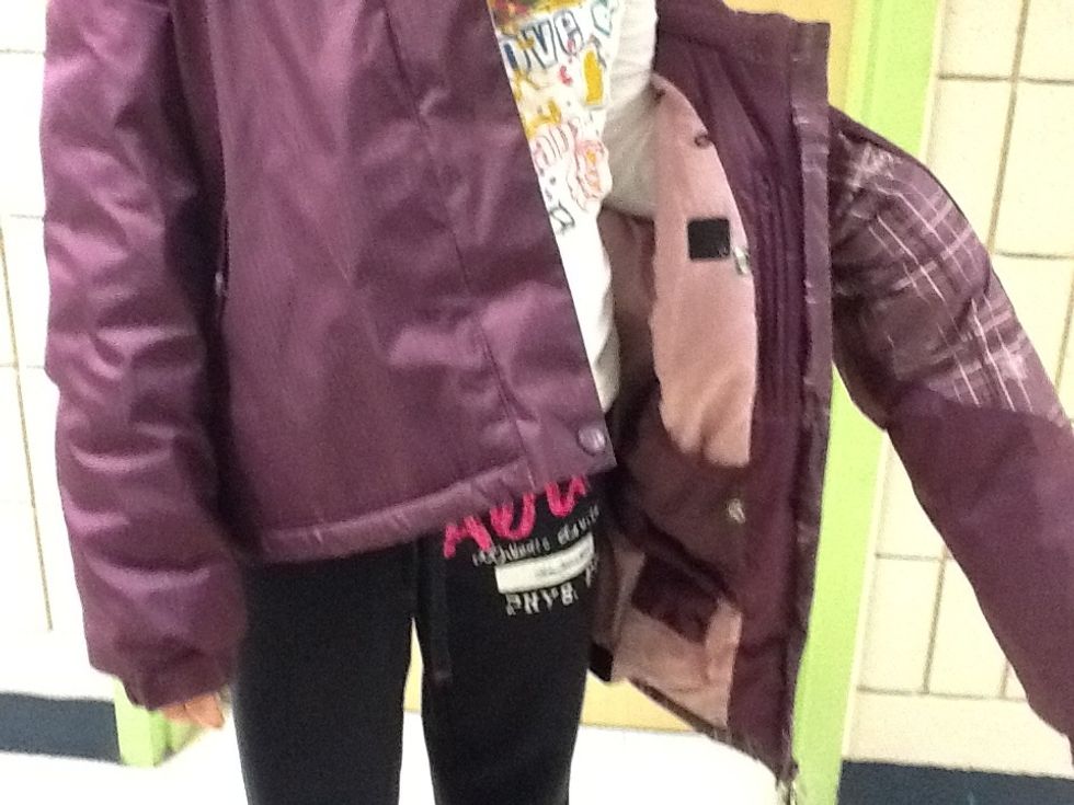 After put you other arm through the other arm hole.