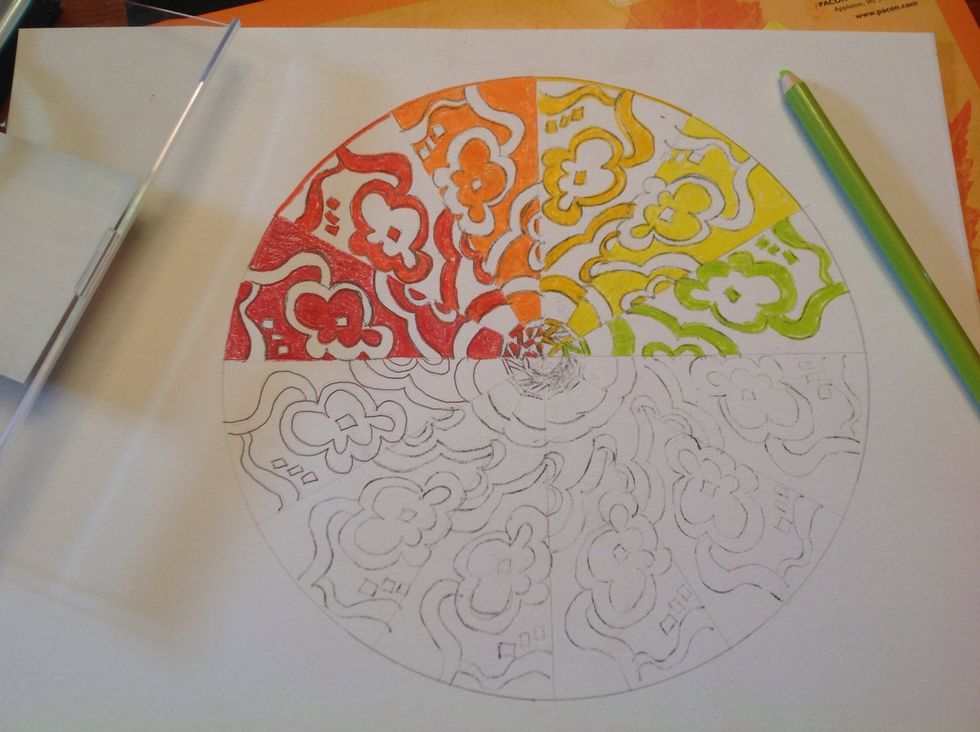 After red comes red-orange, then orange, then yellow-orange, then yellow, then yellow green. You don't have to alternate the coloring of the pieces, but I like the result.