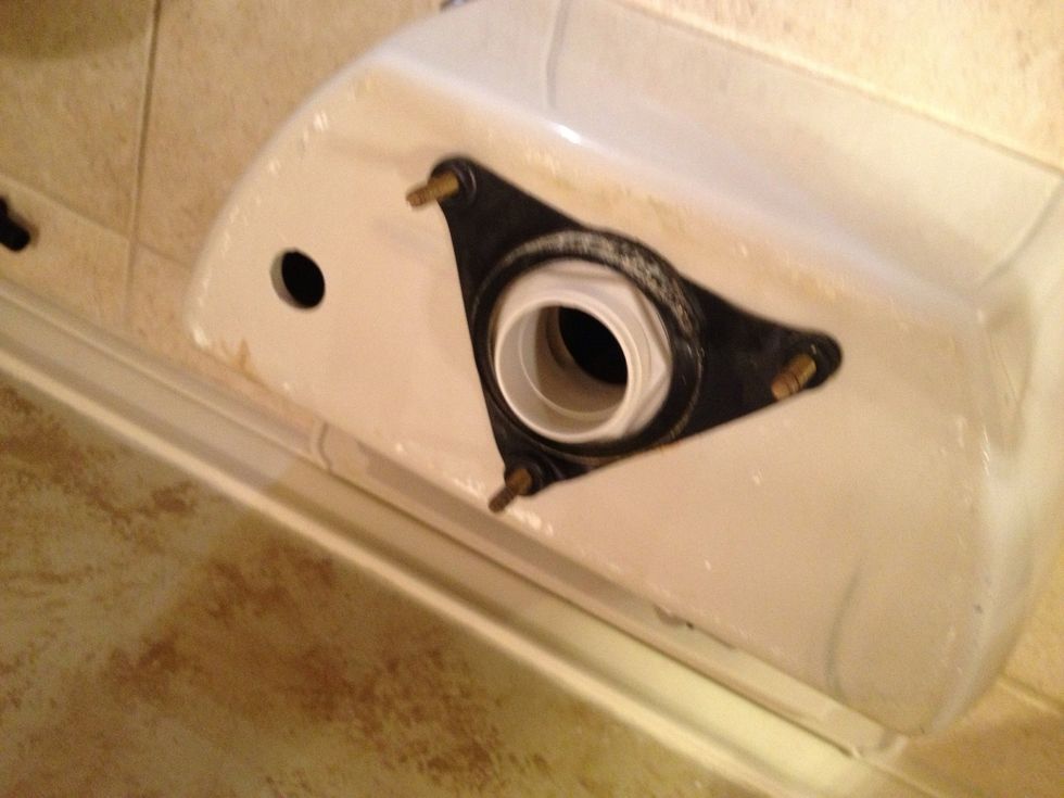 After removing from seat. When you unscrew this the PVC tower comes undone too. Be sure and disconnect chain and flapper to make it easier.