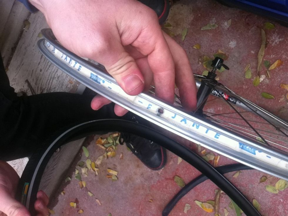 after removing the old tire, find the valve hole on the rim