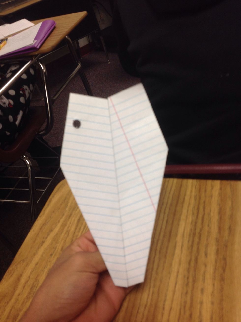 After repeating the step to the other side, your paper airplane should look like this