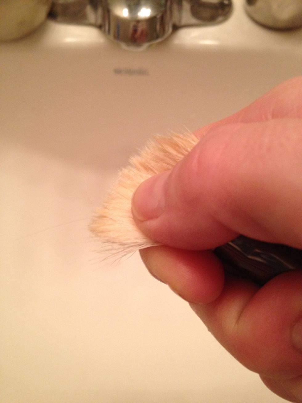 After rinsing, GENTLY squeeze out any excess water from the makeup brush.
