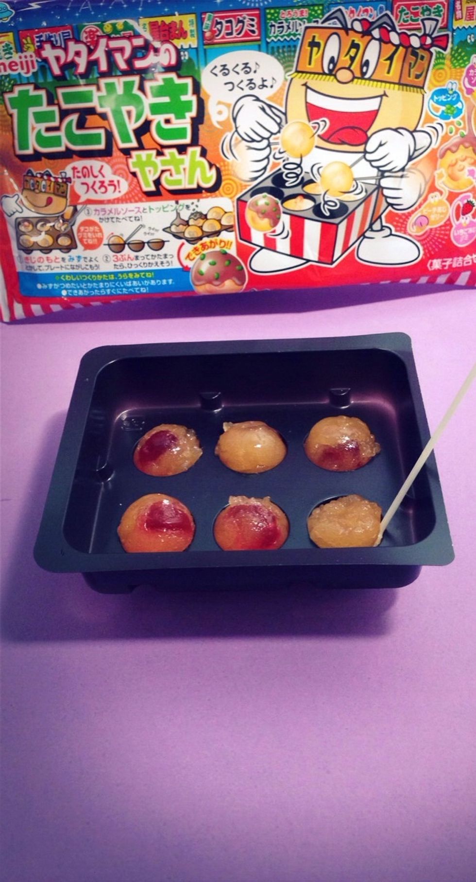 After rolling over bumpy side will be on bottom of mold-Let sit a few seconds and use spoon to roll the ball around the circular mold so it is rounded on all sides