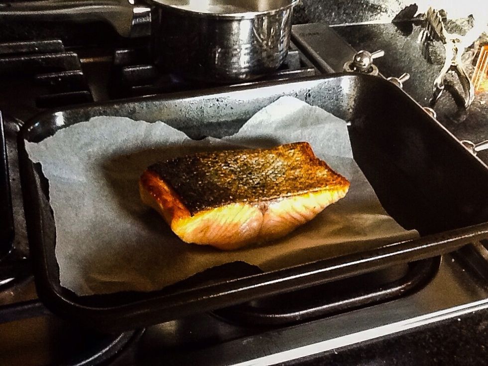 After salmon is cooked put to the side to rest until serving