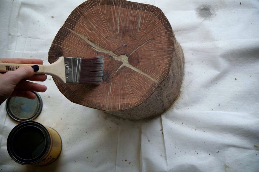 After sanding down the wood filler and wiping away all dust, start your staining! Mix the stain well, then stain along the wood grain, trying to avoid creating bubbles. Keep stain as even as possible.