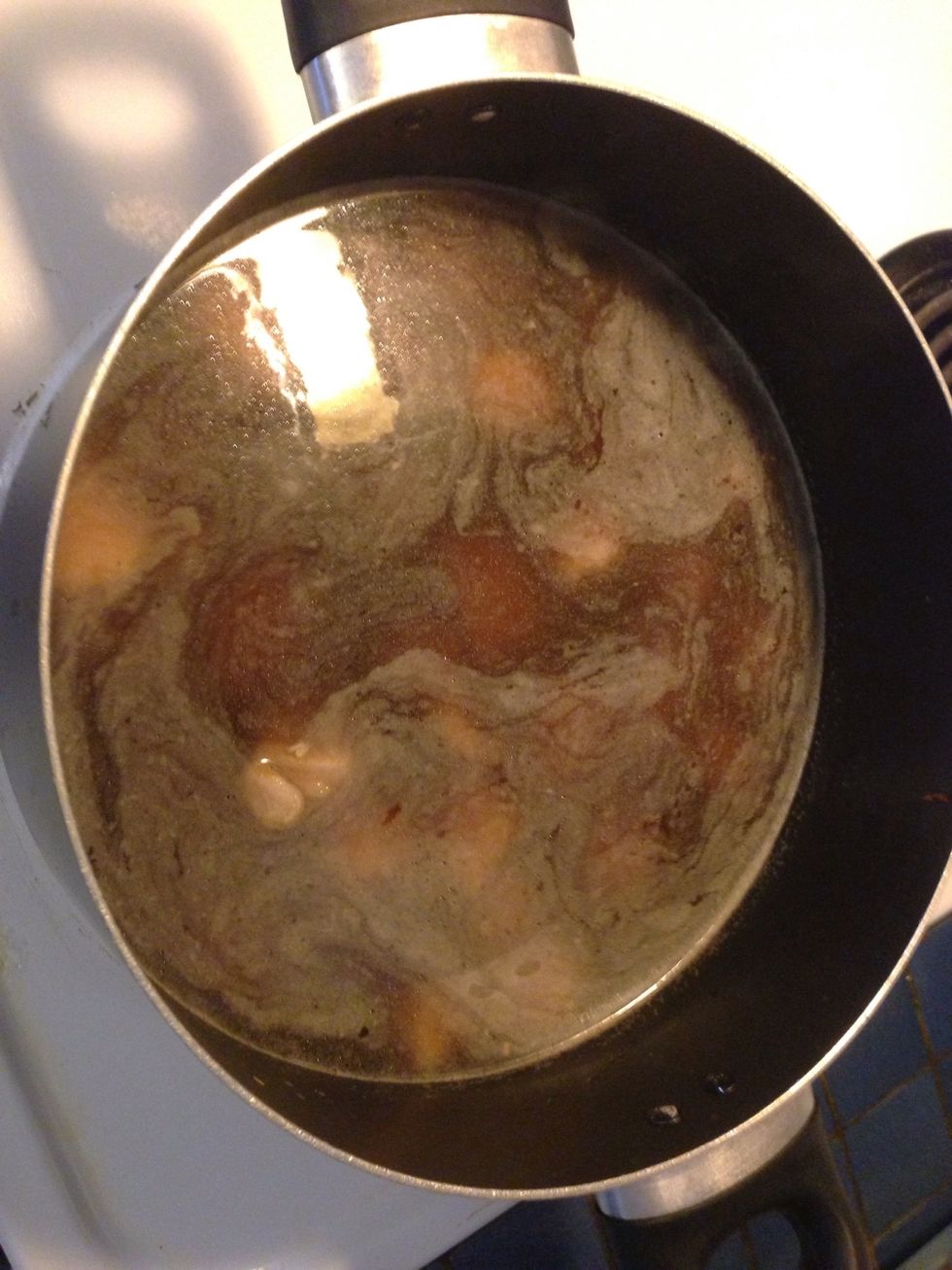 After searing, put in all the ingredients except for the pineapple products and cornstarch, bring your meat to a boil then simmer immediately. Keep covered and stir occasionally until meat is tender.