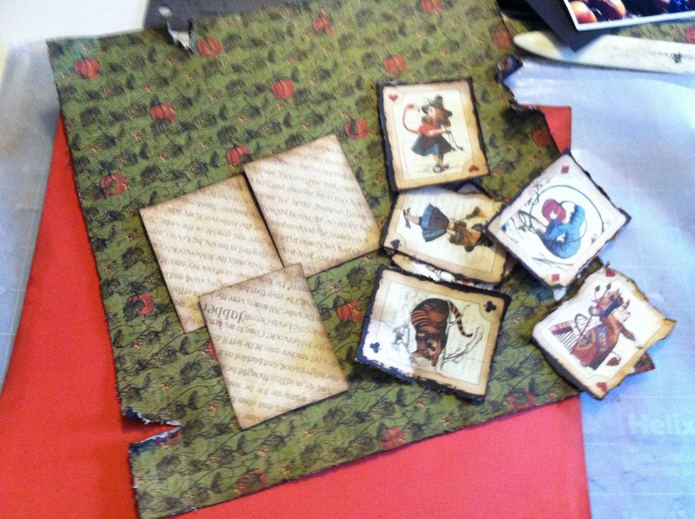 After seeing my distressed sheet on top of the orange card stock, I decided to put pattern paper under the torn parts of the paper. I cut pieces to fit and inked the edges.