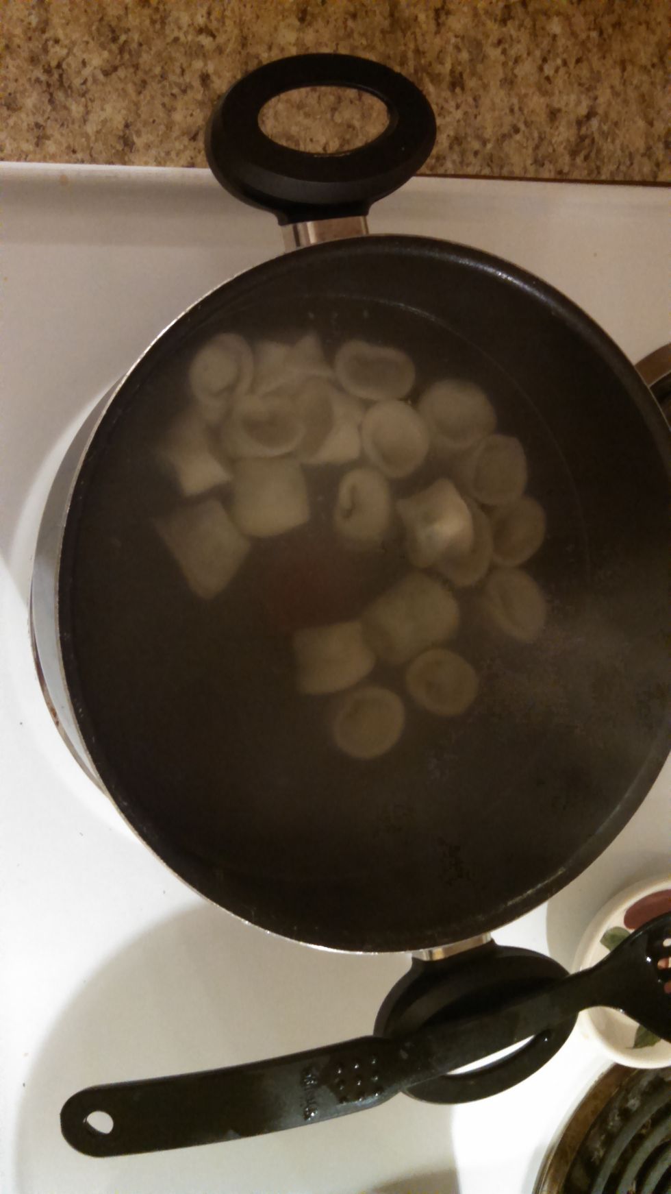 after setting bring water to a boil and add tortellini to water and cook for about 20 mins.