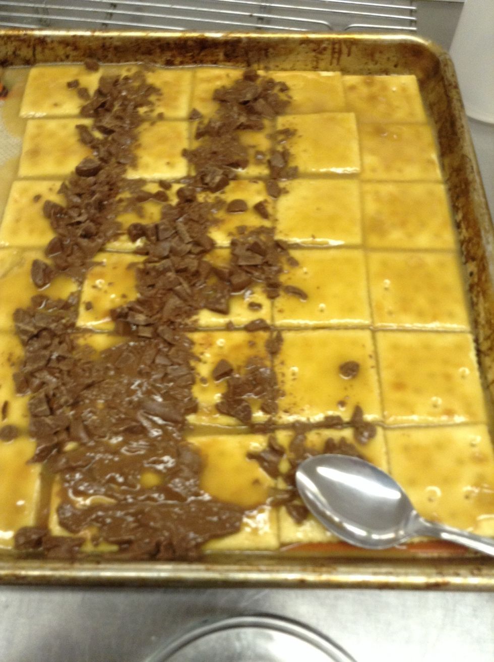 After seven minutes in the oven evenly smooth the chocolate on with the back of a spoon.