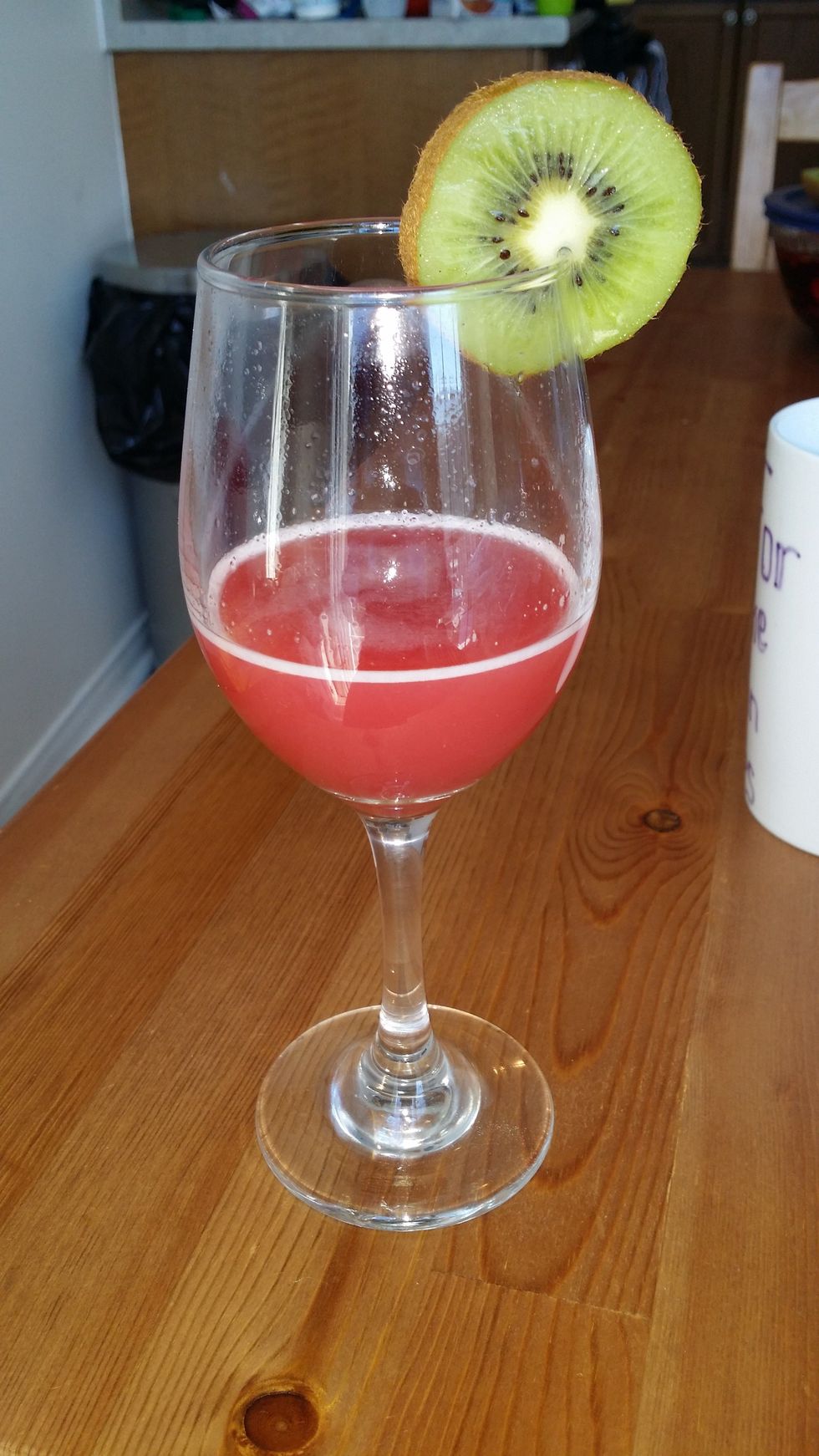After Shaking, Strain in a Fancy Glass , Add kiwi on corner and Enjoy!