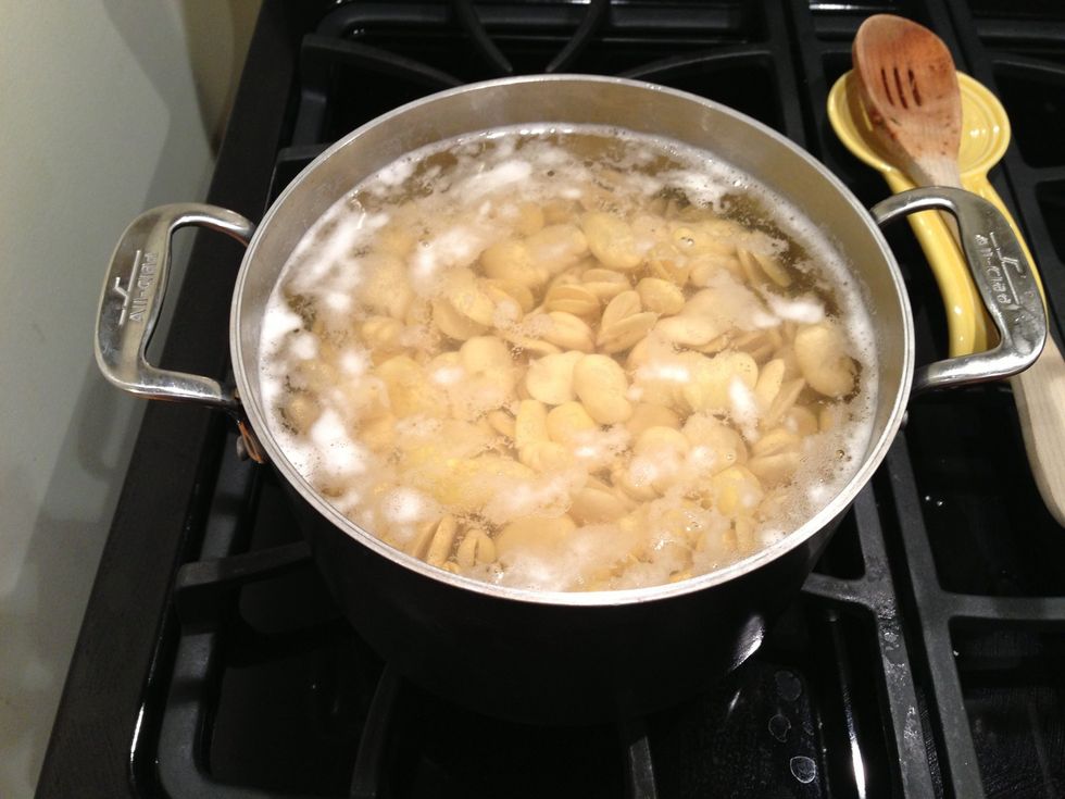 After soaking for at least 6 hours cook the beans. Most people believe you should drain the water you soaked your beans in but recent evidence indicates it's unnecessary to change the water.