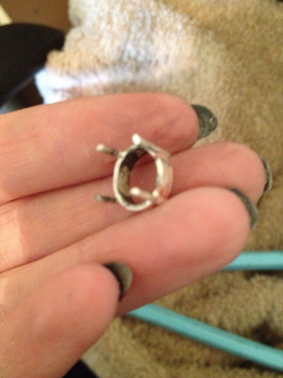 After soldering, pickle your setting, file and buff away any scratches and imperfections.