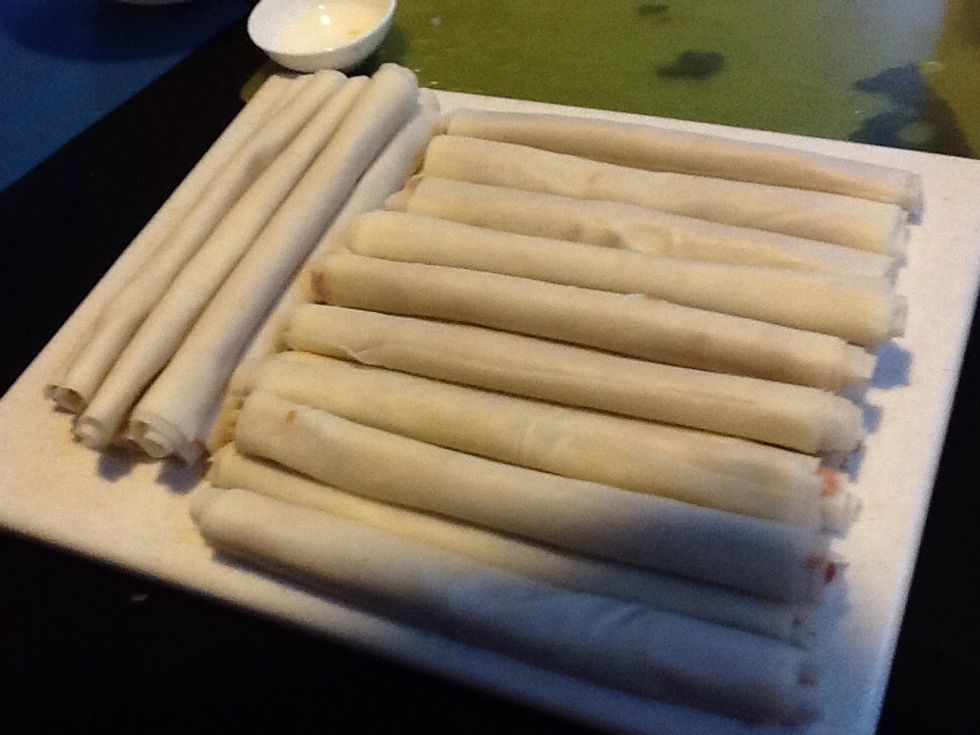 After some perseverance, and a little help, you can amass a large pile of lumpia shanghai! Growing up, mom and her friends would hang in the kitchen knocking dozens of these bad boys out.