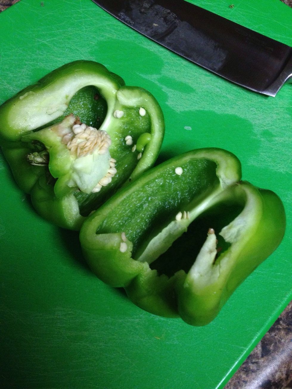 After splitting it, remove the "core" with your hands. Shake the halves over the trash and/or rinse them under cold water to remove the remaining seeds.