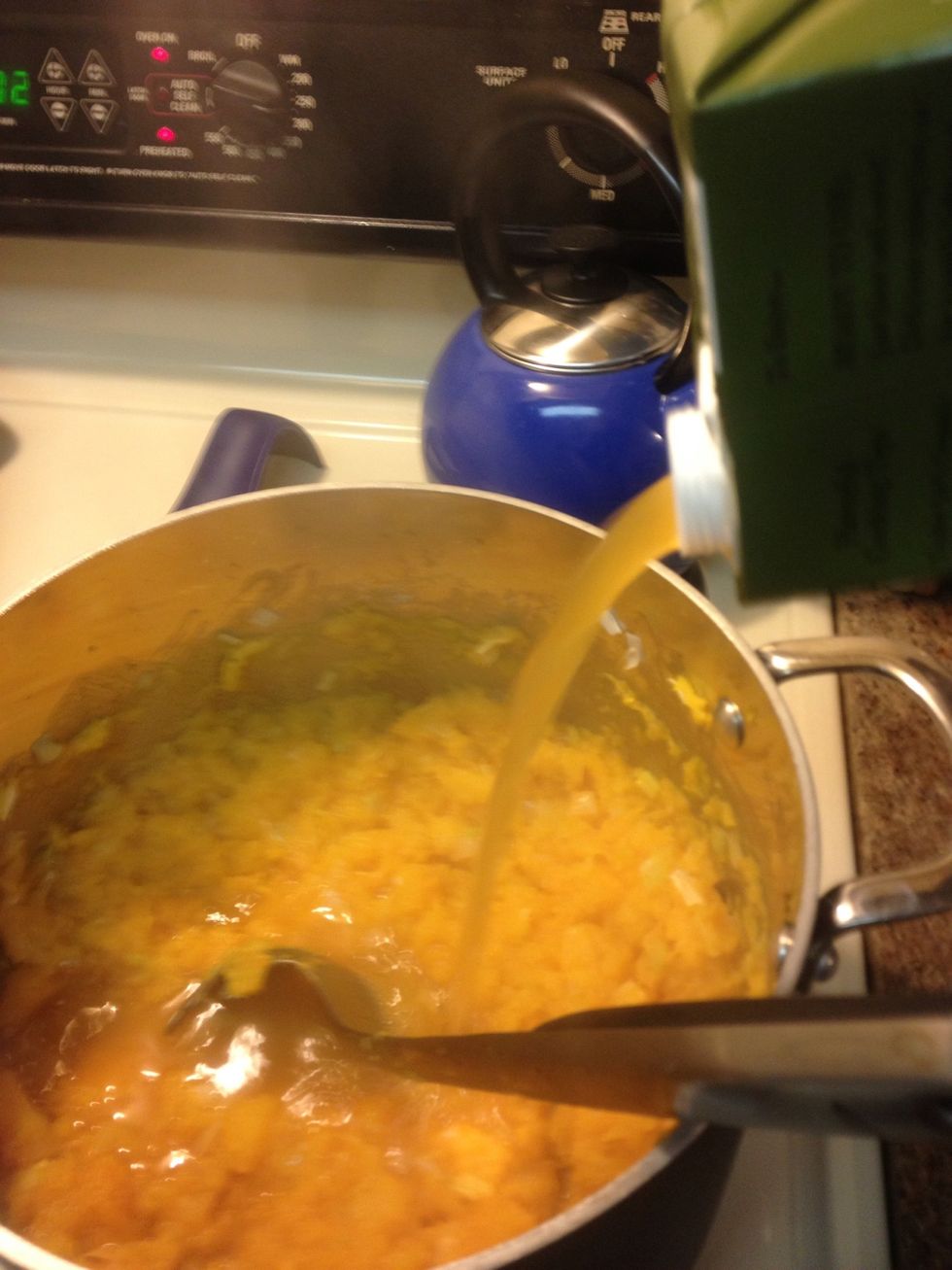 After squash is broken down soft and slightly browned. ~10 minutes. Add 4 cups vegetable broth. Cool for an additional 10-15 minutes at medium heat until squash is nice an soft.