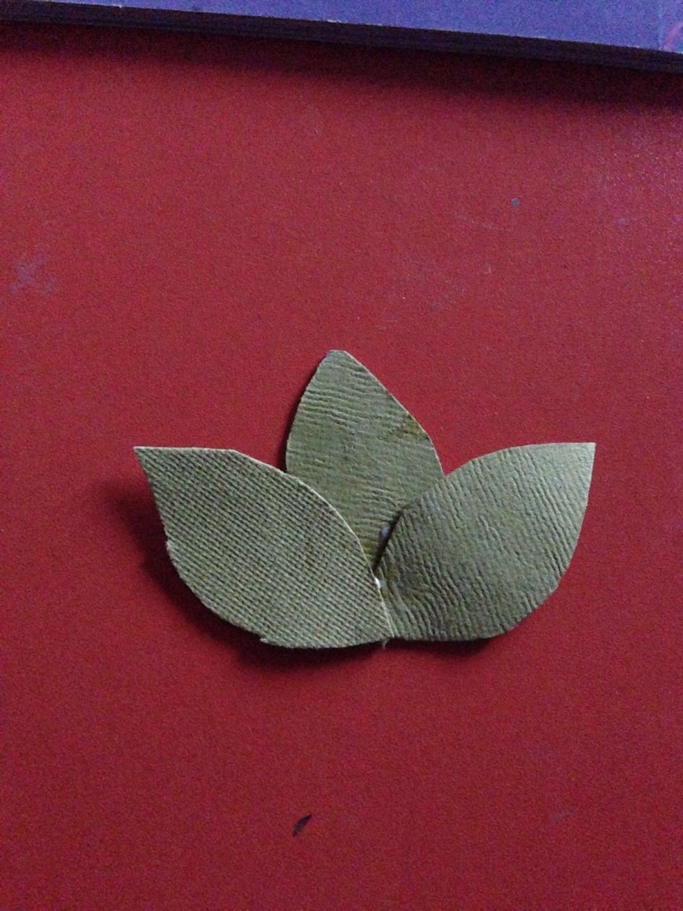 After sticking turn them . The center leave should be first as in the step 5