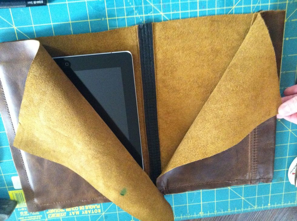 After stitching the top edge you need to find out just where the iPad will sit once in the case. Measure 9.75" from the top stitch an that is where your bottom stitch line will be.