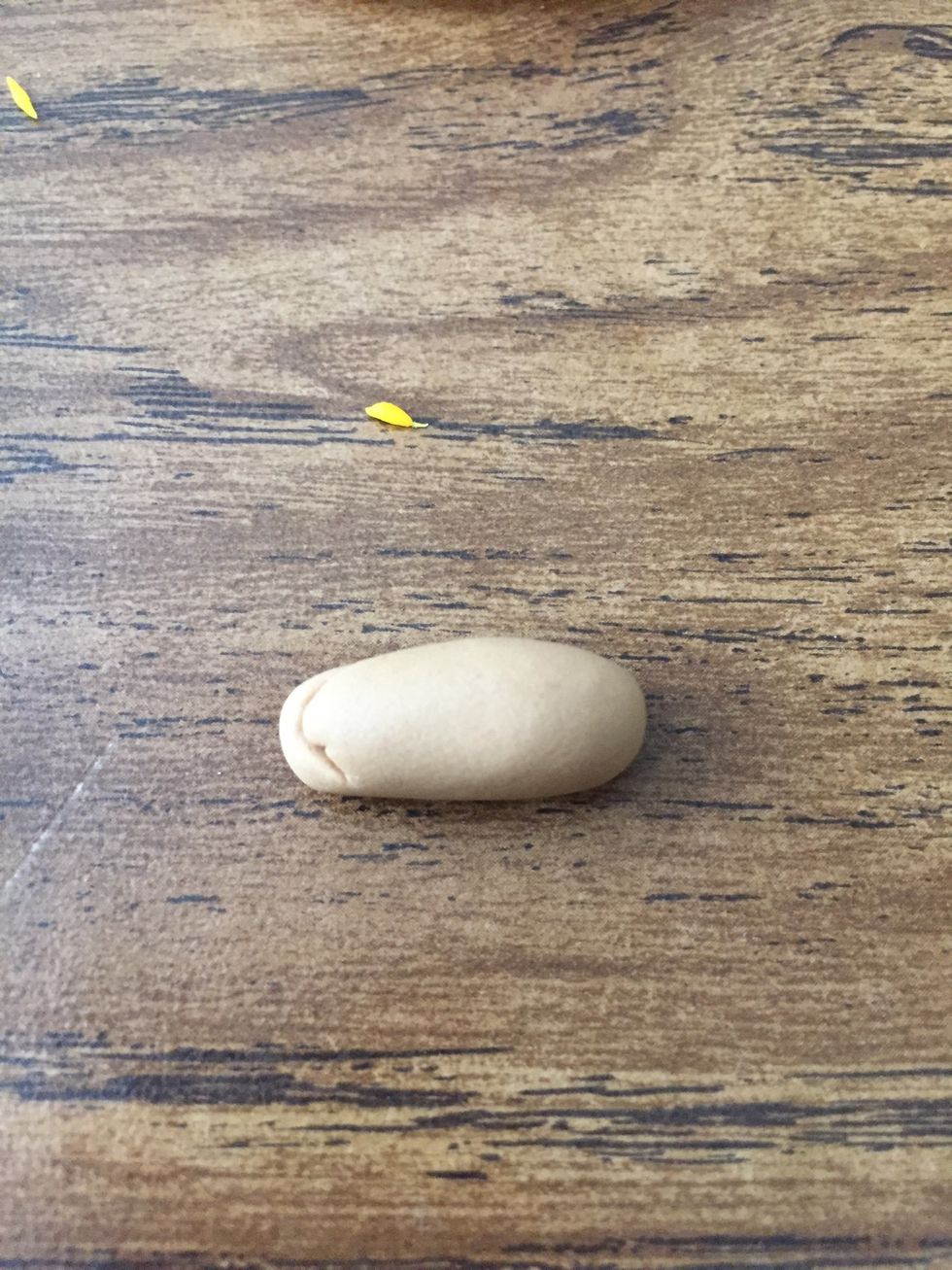 After take a little pinch of brown play doh and roll it into a stem