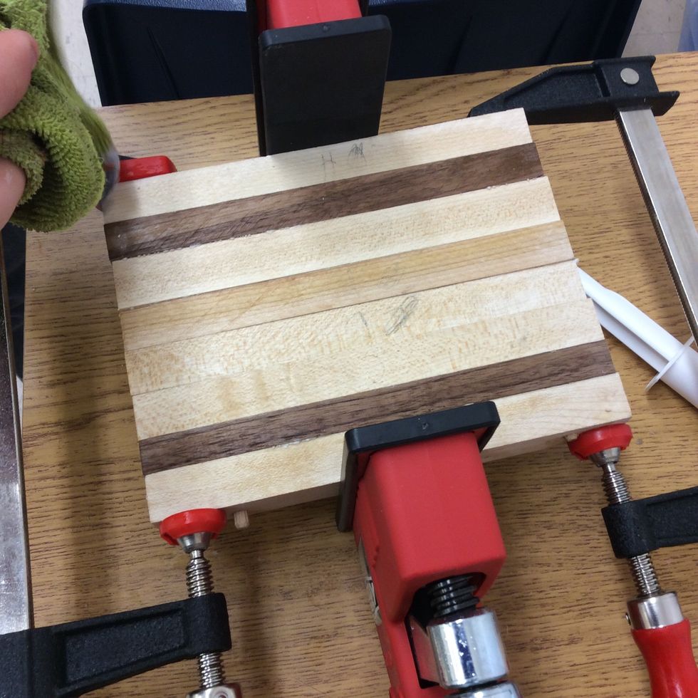 After taking away the extra glue you leave the glue dry so your cutting board doesn't break you have to wait about a half hour until you can move on to the next step