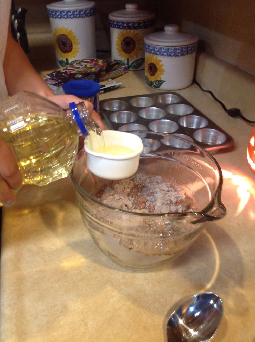 After that, add 1/2 cup of vegetable oil.