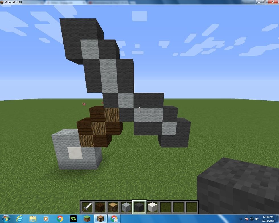 After that add 12 Grey Wool Blocks on the outside.