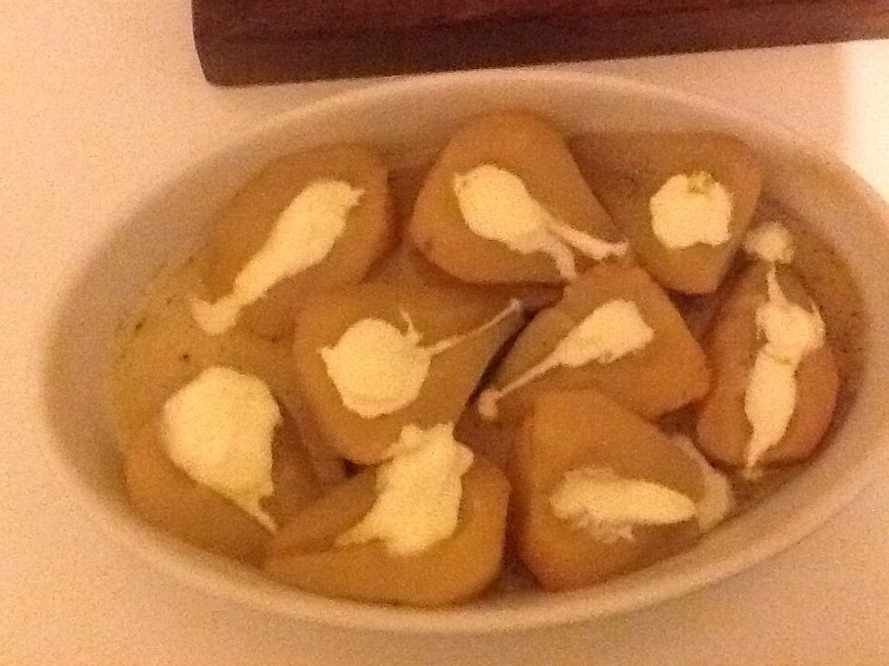 After that add cream to the cored hollows and cook for a further 15 minutes.